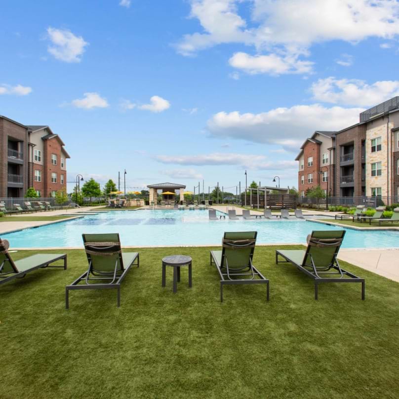 Resort-style pool with cascading water features